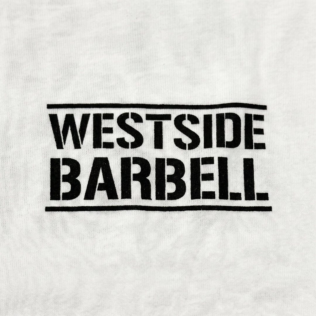 Close-up of the Westside Barbell logo on the left chest of the white Fourth of July tee