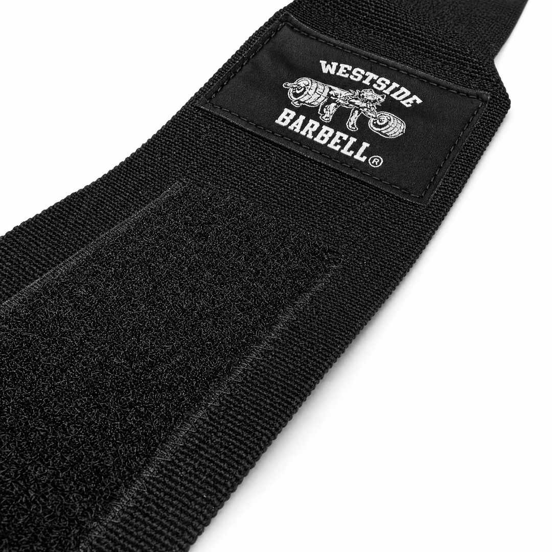 Close-up of Westside Barbell logo patch and Velcro closure on wrist wrap