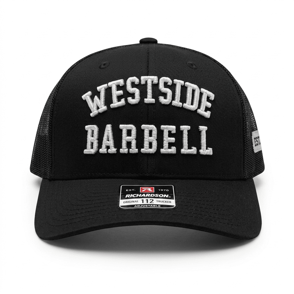 Westside Barbell EST. 1972 black trucker snapback shown from the front with white WESTSIDE BARBELL embroidery