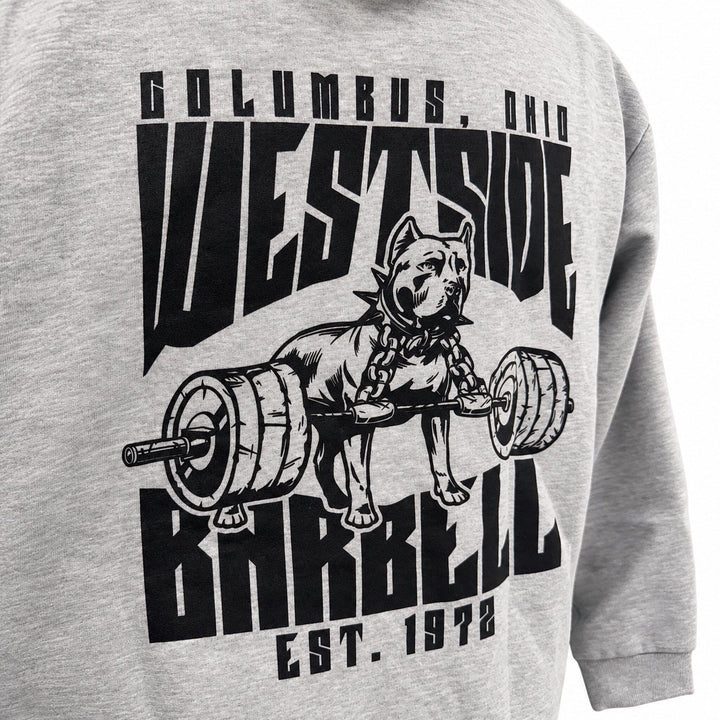 Angled back view of grey heather Westside Barbell graphic hoodie